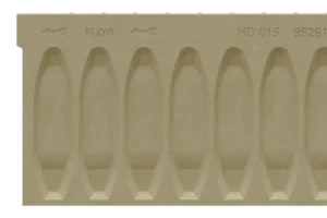 Beige plastic mold with a repeating row of oval cavities and arrows labeled FLOW.