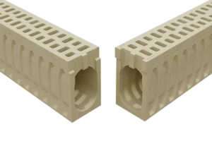 Two hollow concrete blocks arranged in an L-shaped corner for construction.